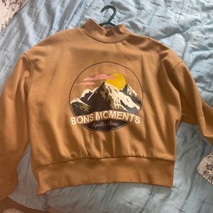 Turtle neck, brown sweater, graphic design